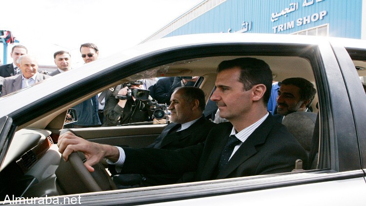 “بالصور” المجرم بشار الأسد يدشن مصنع سيارات جديد سوري – ايراني بمعدل 100 سيارة شهرياً