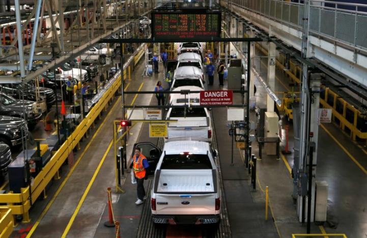 File photo of then all-new Ford 2015 F-150 pickup trucks moving down the final inspection line at the Ford Rouge Center in Dearborn