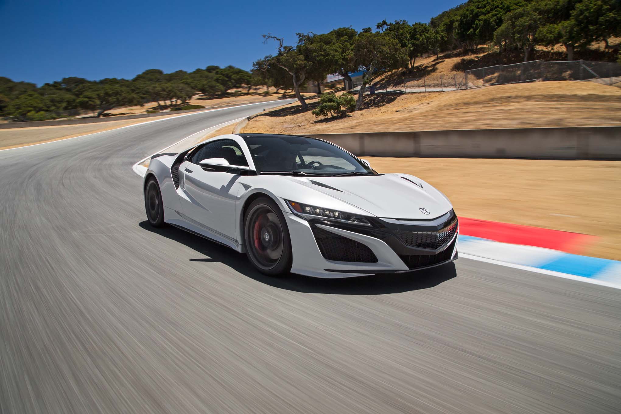 2017-acura-nsx-front-three-quarter-in-motion-02