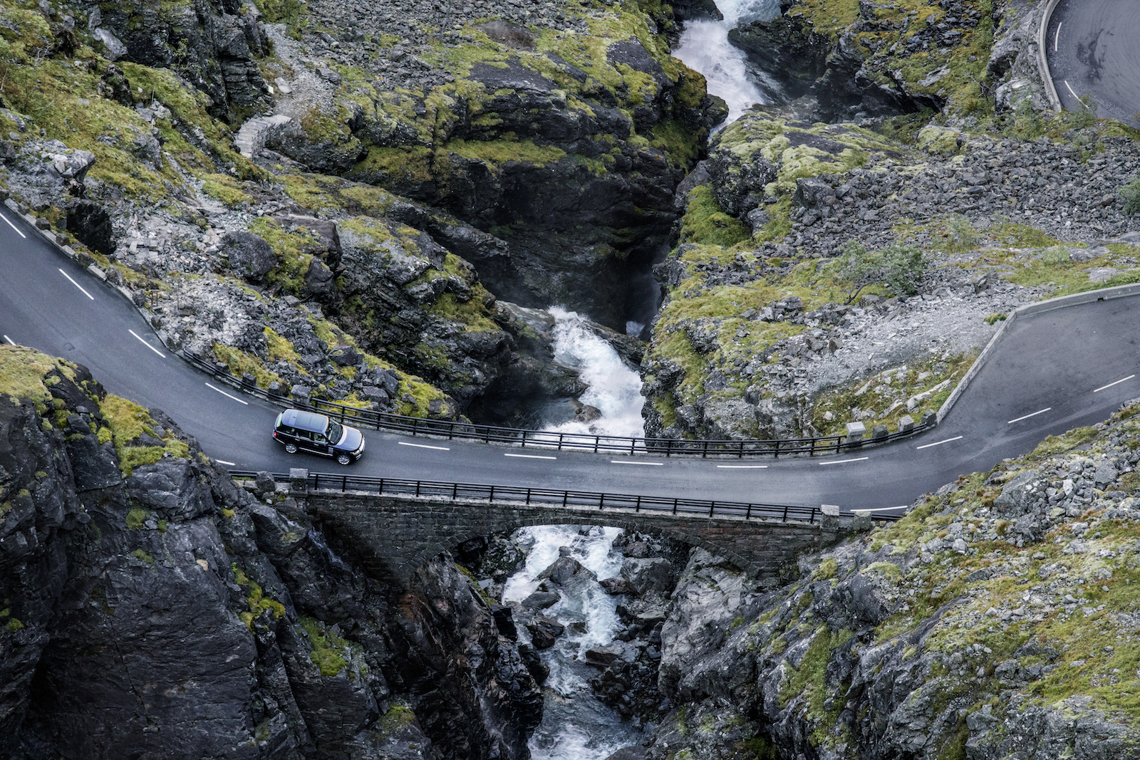 NORWAY. 2016. Trollstigen.  The famous Trollstigen road, a series of switchbacks winding its way through a steep cliffside near Åndalsnes. Photographed on assignment from Land Rover.