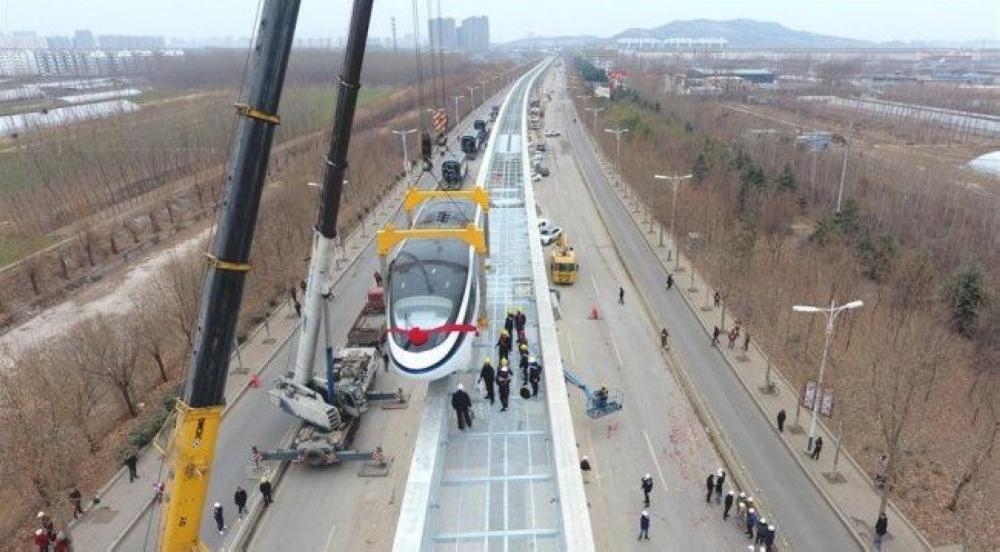 "بالفيديو" شاهد كيف تم بناء سكة قطار في 9 ساعات فقط بالصين 2