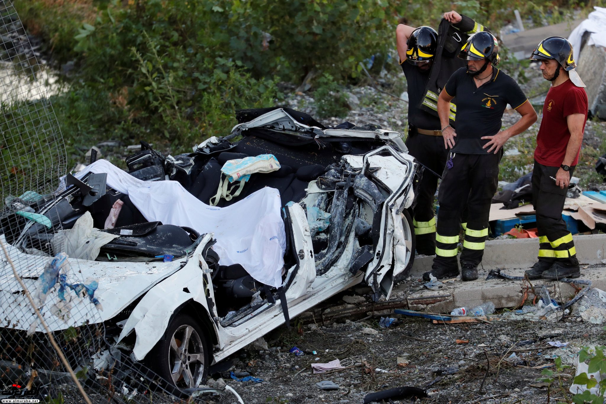 "بالصور" 39 قتيلا حصيلة ضحايا انهيار جسر جنوة الإيطالي 24