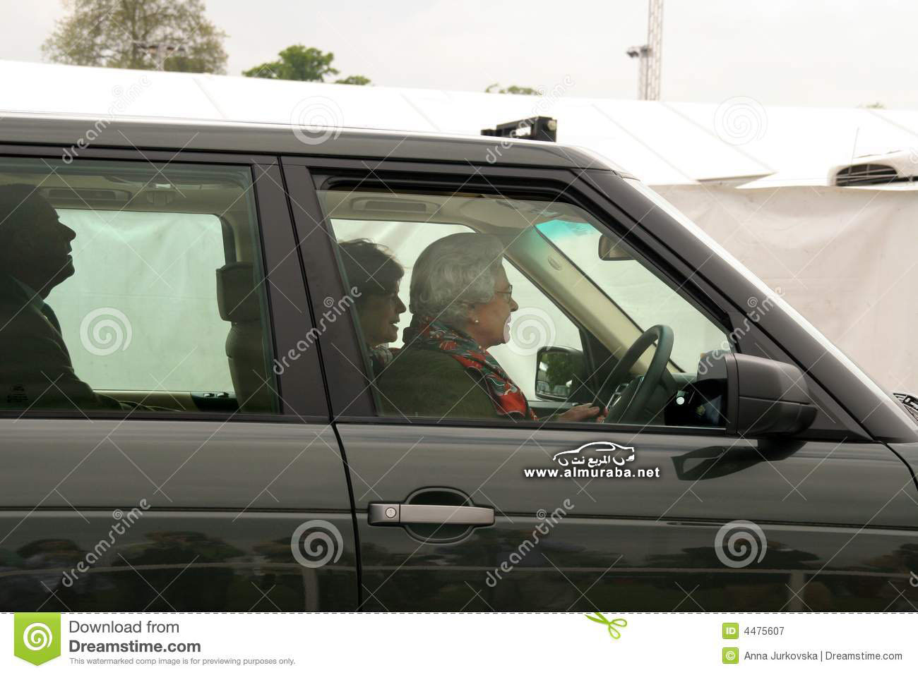 http://www.dreamstime.com/royalty-free-stock-photography-queen-elizabeth-driving-car-image4475607